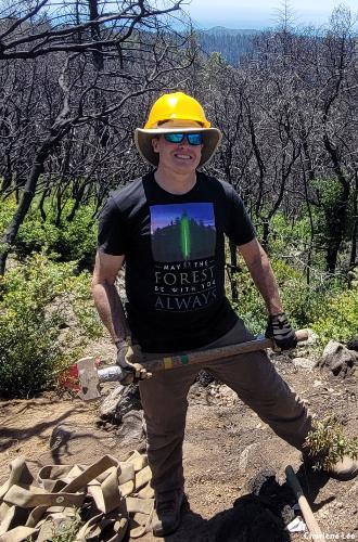 Hilltromper's managing director, Mike Kahn, doing volunteer trail work with Santa Cruz Mountains Trail Stewardship at San Vicente Redwoods. Credit: Charlene Lee