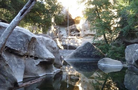 The swimming hole near Indians—with rope swing and rocks for high noon sunning. Photo by Brooke Wright.