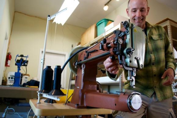 Peter Julber of Santa Cruz Gear Repair readies 'The Beast' for action. Julber's shop mends tents, sleeping bags, backpacks, even leather jackets.